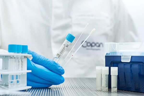 microbiologist-handling-enat-tube-and-swabs.jpg